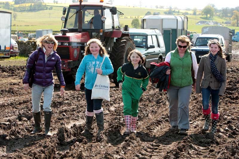 John Stevenson. Courier. 19/05/12. Fife, Cupar, The Fife Show. Pic shows group heading home through the mud l/r they are Judith Lamont, Eve Duncan, Anya McGaddery, Pam and Zoe Duncan.