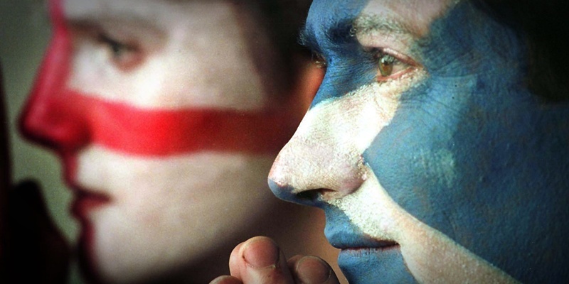 Edinburgh football fans Mark Roberts (right) and David Johns hope for the best for their teams, in the Euro 2000 Championship playoff football match between England and Scotland at Hampden Park stadium, Glasgow, on 13/11/99.