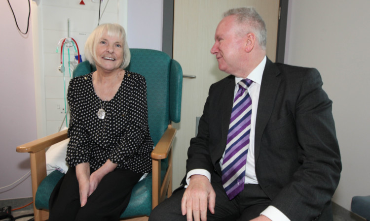 Mary Saunderson with Mr Neil, who praised the introduction of the hub.