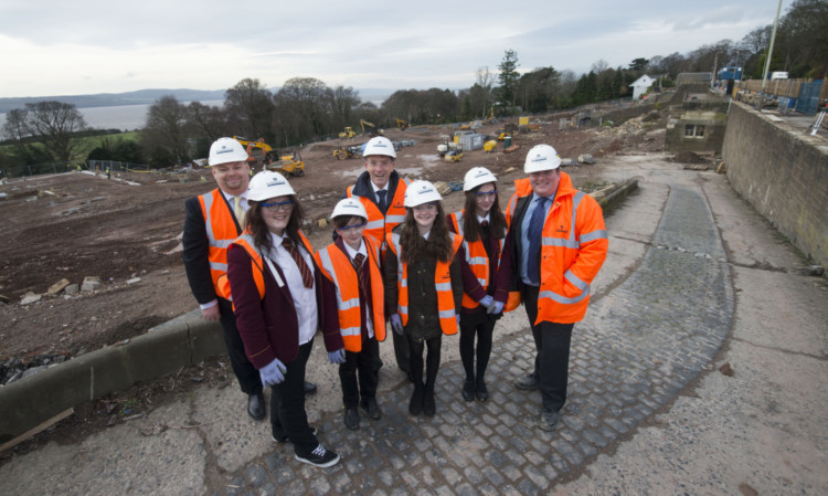 From left: education convener Stewart Hunter, Kelsey Duffy, 14, Keir Rodger, 13, head teacher Jim Thewliss, Grace Lynch, 13, Zoe Scott, 14, and Keith Taylor of Robertson Construction.