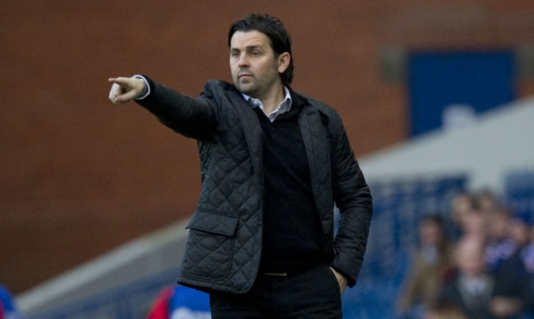 Paul Hartley is favourite for Dens post.