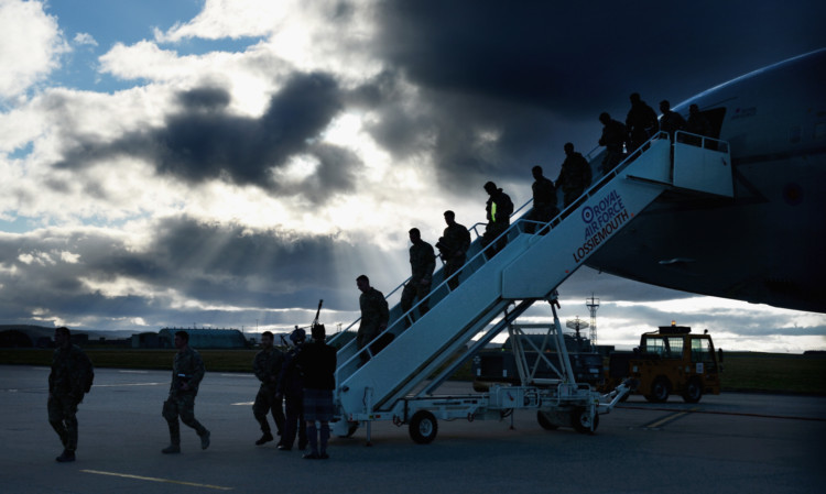 Members of the squadron return to Lossiemouth.