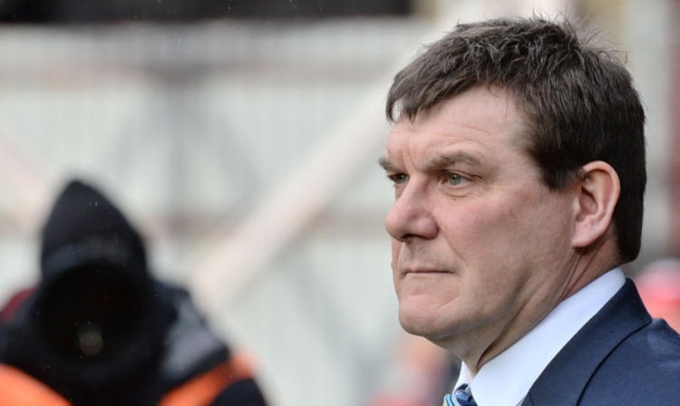 Saints boss Tommy Wright has no qualms over facing Forfar on their 3G Station Park pitch in the Scottish Cup fifth round clash.