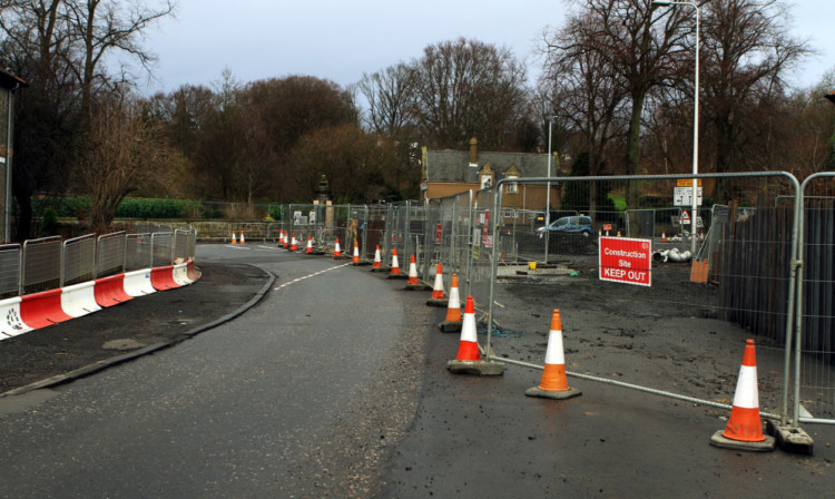 Work on Dunfermline's flood protection scheme is already £11 million over budget.