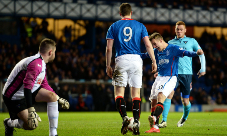 Rangers' Dean Shiels rounds off his hat-trick early in the second half.