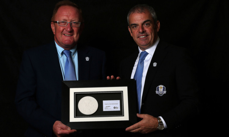 Ryder Cup director Richard Hills and captain Paul McGinley with a plaster cast of the new coin.