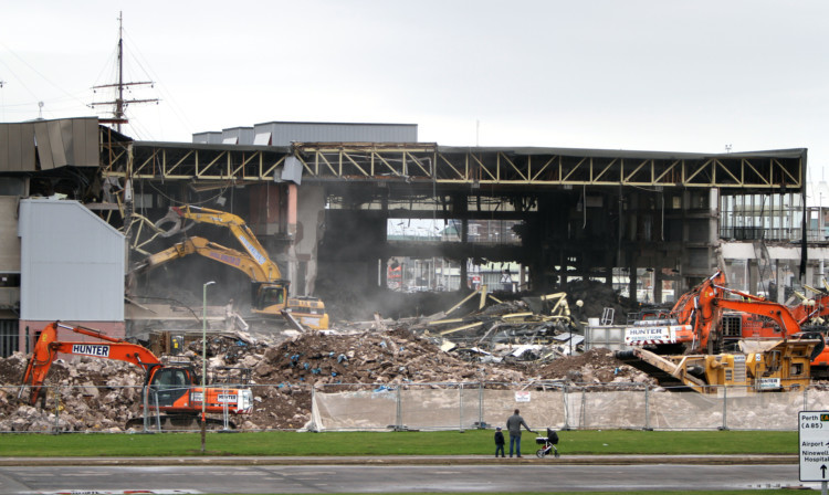 Part of the roof collapsed on a digger during demolition of the Olympia last month.