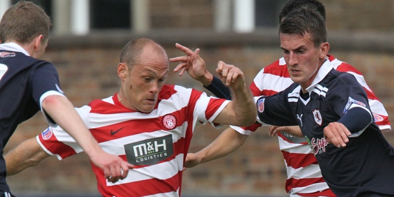 G Jennings pic Raith v Hamilton , Grant Andeson tackled by Alex Neil of Hamilton