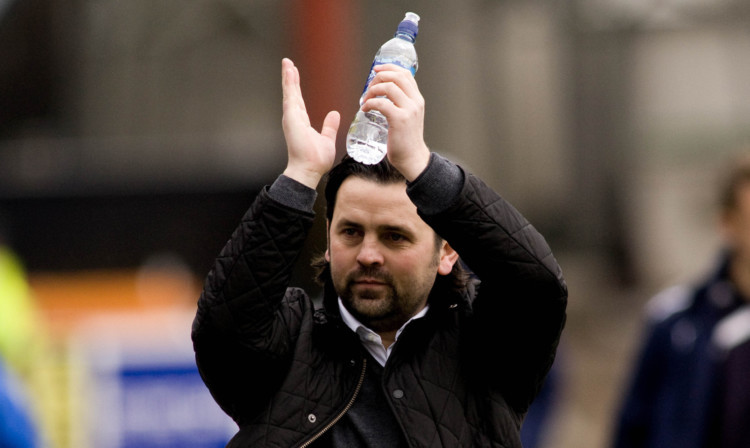 Paul Hartley applauds the Dark Blues fans at half-time during his first match in charge against Hamilton.