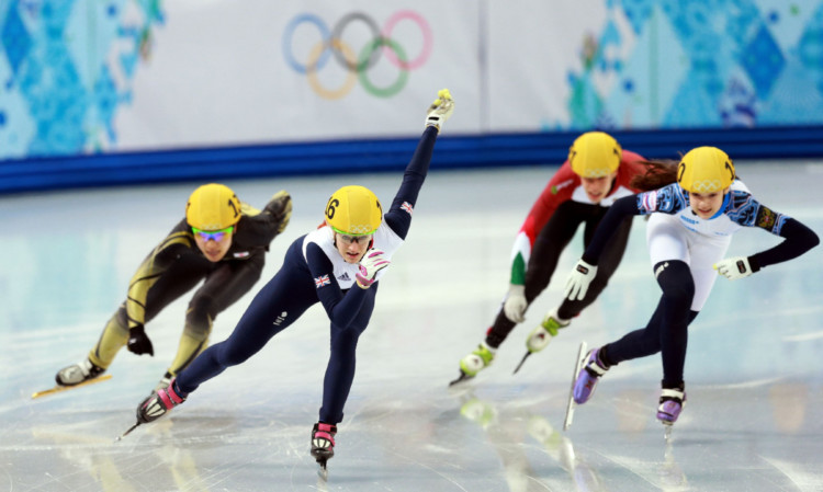 Team GBs Elise Christie on her way to victory in the heat of the Womens 500m Short Track skating in Sochi.