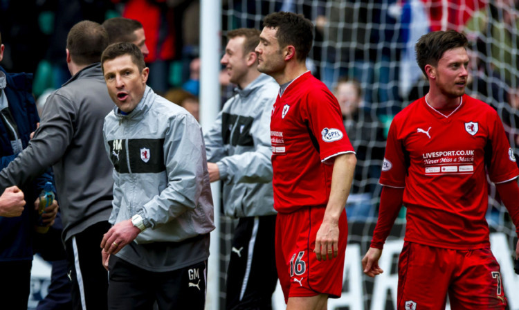 Joe Cardle, right, celebrates with Raith team-mates and boss Grant Murray following their shock Scottish Cup victory at Easter Road.