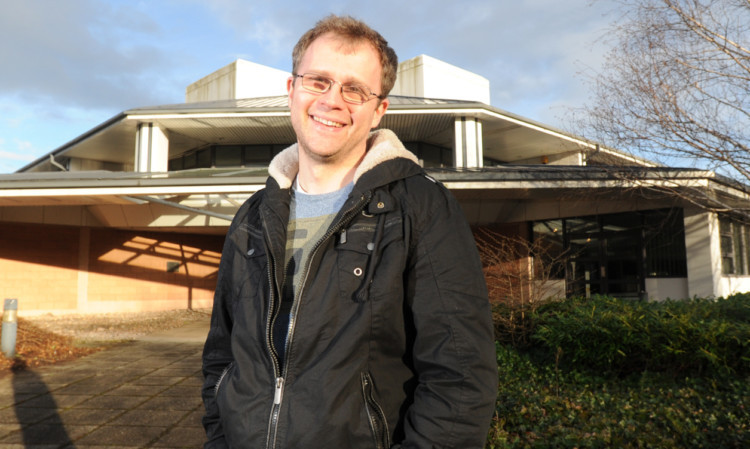 Pastor Gareth Sherwood outside the former Aviva offices which have been lying empty since 2008.