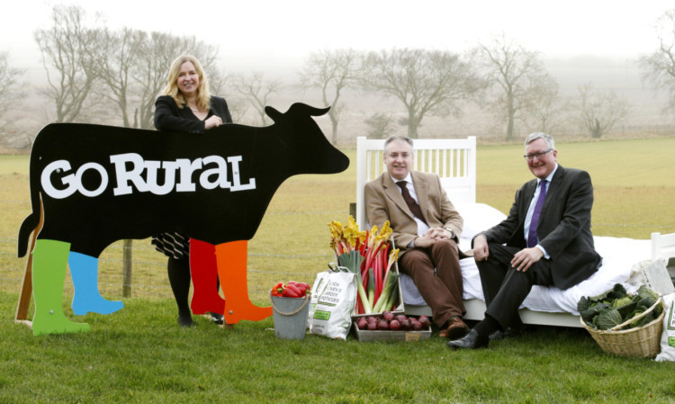 Mr Lochhead, centre, with Caroline Millar of GoRural and Tourism Minister Fergus Ewing.