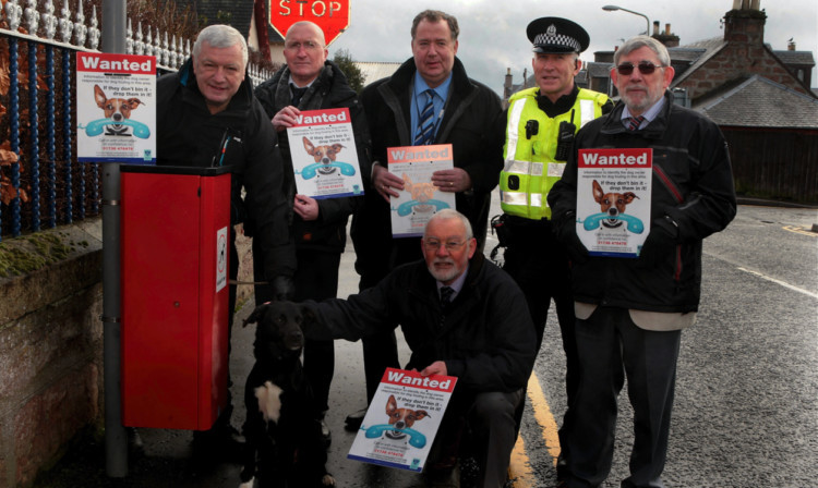 From left; Denis Hearsham, Animal Welfare Rights, Derek Hutchison, Trading Standards, Cncllr Douglas Pover, Const Steve Brown, Cncllallan Grant and in front Cncllr Bob Ellis with Rico.