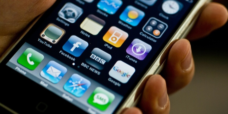 File photo date 01/07/08 of an Apple iPhone as three-quarters of parents with smartphones share apps with their children and more than a third consider them to be an 'integral' part of family life, according to a study.