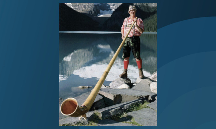 William Niel Gow playing the Alphorn at Lake Louise in Canada.