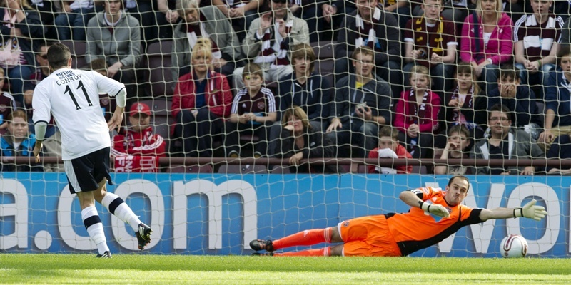 02/09/12 CLYDESDALE BANK PREMIER LEAGUE
HEARTS V DUNDEE (0-1)
TYNECASTLE - EDINBURGH
Dundee's Ryan Conroy (left) scores from the penalty spot to give Dundee an early lead.