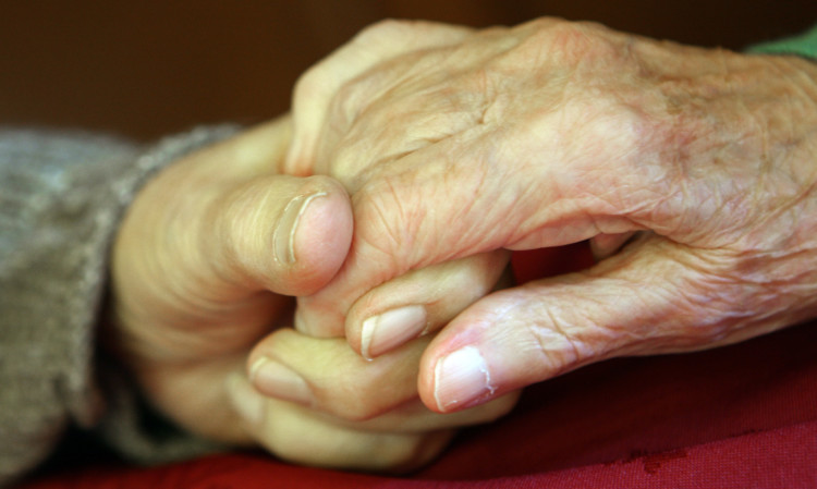 Mr and Mrs Sauvary hold hands during their special Valentine's lunch.