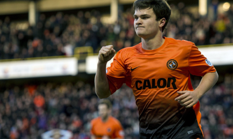Curtis Good celebrates after equalising for Dundee Utd.