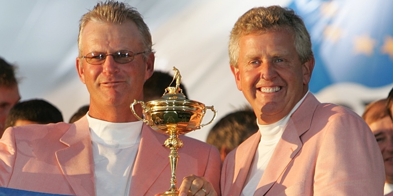 Assistant Captain Sandy Lyle and Colin Montgomerie, Europe Ryder Cup Team Player celebrate.