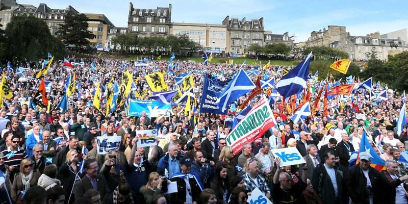 Crowds gather at a rally for Scottish Independence in Princess Street Gardens, Edinburgh, as thousands of people took to the streets of Edinburgh in one of the largest pro-independence marches the city has seen.