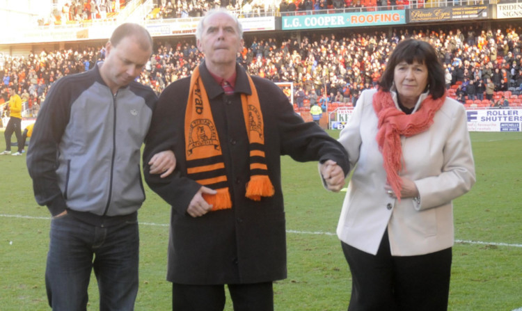 Frank on the pitch with wife Amanda and son Scott.