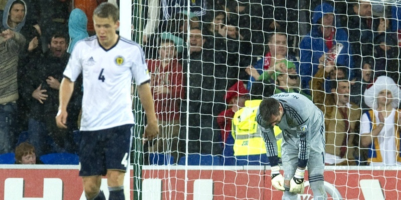 12/10/12 2014 WORLD CUP QUALIFIER 
WALES v SCOTLAND (2-1)
CARDIFF CITY STADIUM - WALES
Allan McGregor (right) hangs his head after Gareth Bale's penalty hauls Wales level