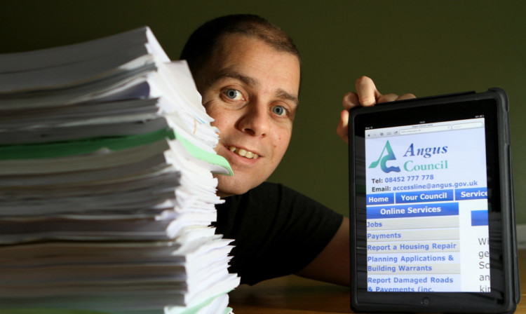 Cllr Ewan Smith is calling for Angus Council to go 'paperless'.