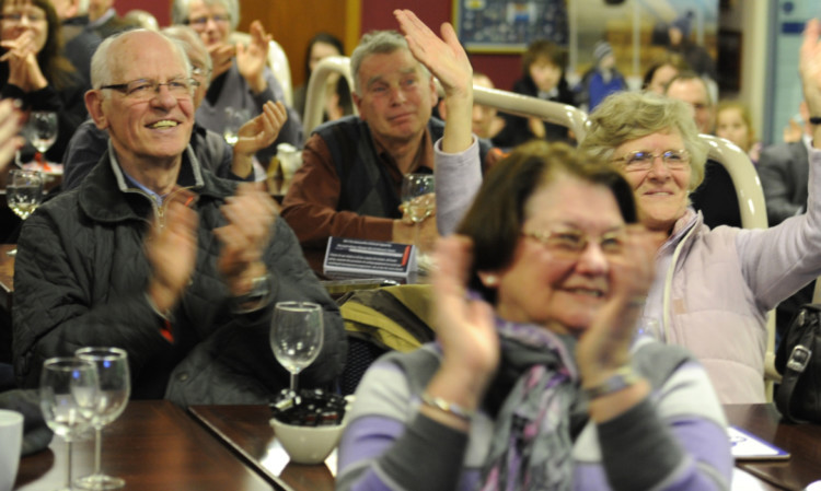 Curling fans cheer on Team GB during the final.