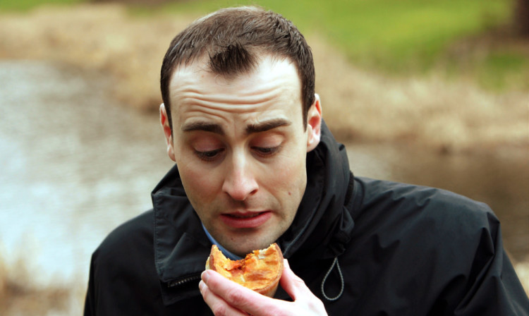 Reporter Jonathan Watson gets stuck into one of the Stuarts of Buckhaven pies.