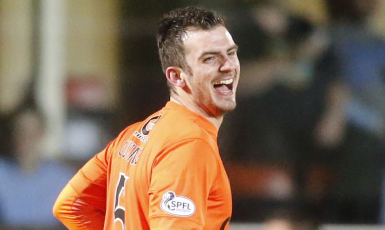 Gavin Gunning sees the funny side after his free-kick deflected into the net for his second goal against Motherwell.