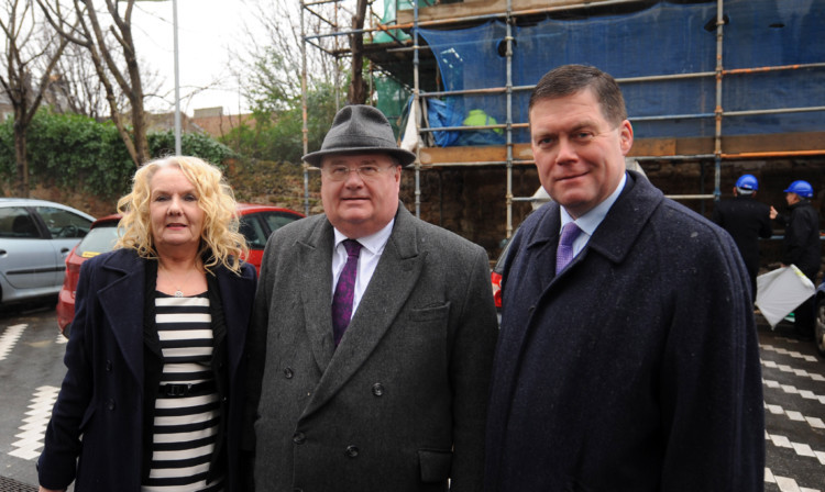 UK Communities Secretary Eric Pickles flanked by Marilyn Livingstone and Michael Levack of the Adam Smith Global Foundation.