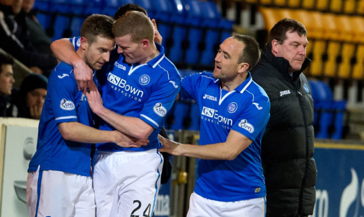 Steven MacLean, left, is congratulated by Brian Easton and Lee Croft after scoring his second goal of the night.