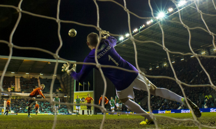 Dundee Utd's Gary Mackay-Steven (left) blasts his penalty over the bar.