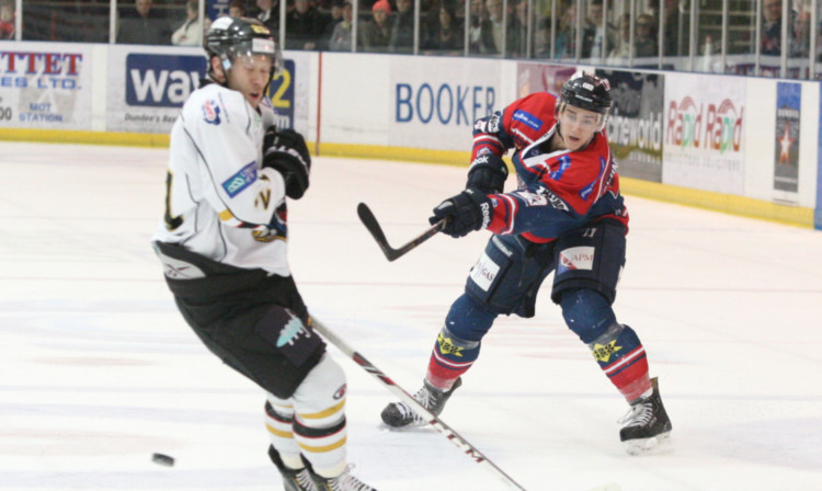 Stars Paul Swindlehurst fires in a shot at the Panthers goal in last nights game at Dundee Ice Arena.