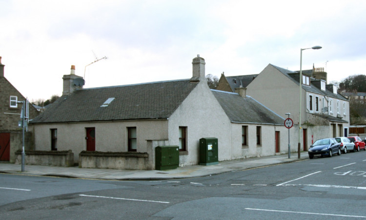 The north-west corner of the Brook Street/St Vincent Street junction.