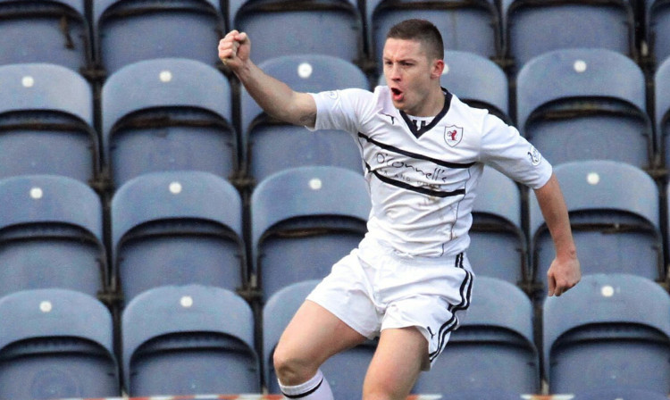 John Baird jumps and punches the air after scoring a goal for Raith Rovers.