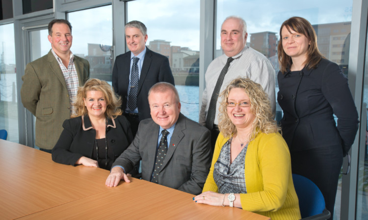 From left: Tim Allan of Unicorn Property Developments, chief executive Sandra Burke, Dougy Agnew of Henderson Loggie, David Valentine of Valentine International Business Connections, Mark Munsie of Dundee Heritage Trust, Alison Henderson of My Pinkie Promise, and Deborah Miller of Simpson Marwick. Directors Stuart Grant of the Apex Hotel and Andy Ross of GSK were unavailable.
