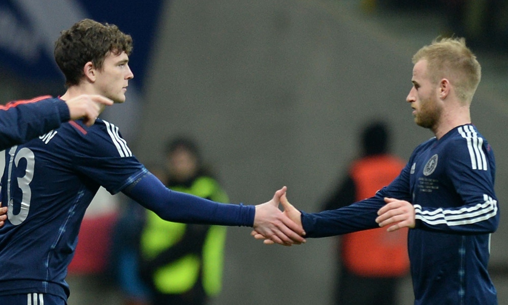 06/03/14 INTERNATIONAL FRIENDLY
POLAND v SCOTLAND
NATIONAL STADIUM - WARSAW
Barry Bannan (right) makes way for Andrew Robertson for his Scotland debut
