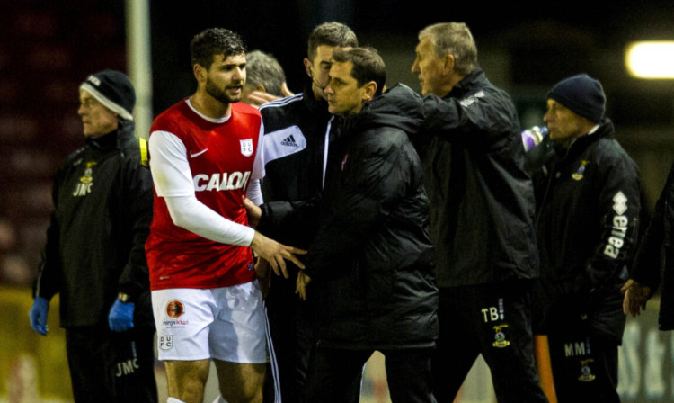 Jackie McNamara tries to calm Nadir Ciftci during the cup tie in Inverness.