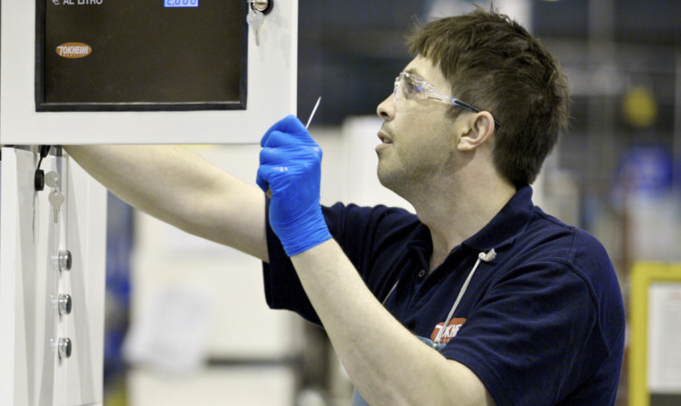 A Tokheim employee at the firms West Pitkerro industrial plant.