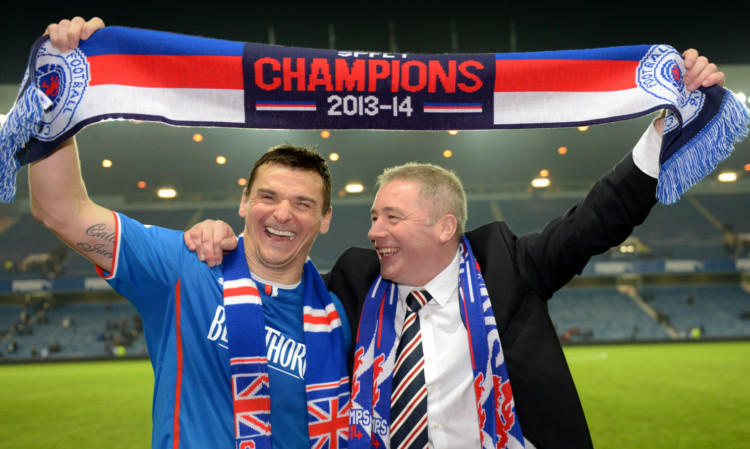 Delight on the face of Rangers captain Lee McCulloch and manager Ally McCoist as they celebrate clinching the Scottish League One title.