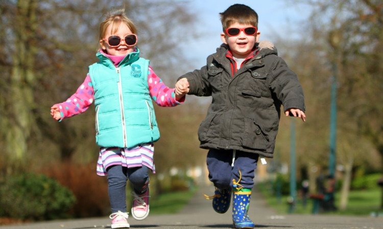 Poppy Warner and Fraser Johnston don shades in Pittencrieff Park, Dunfermline.