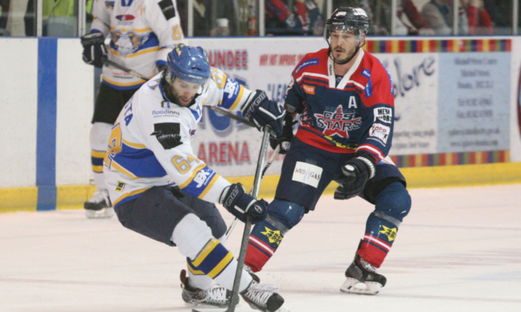 Billy Bagron closes down Fifes Justin DaCosta during the clash in Dundee.