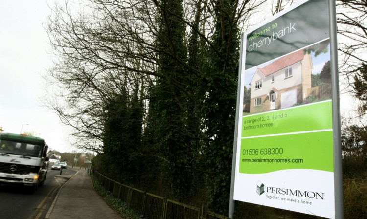 The sign for the forthcoming Persimmon homes development at Cherrybank.