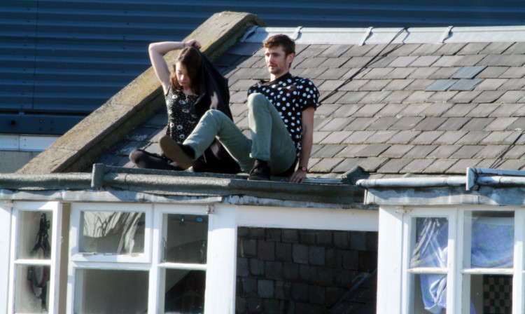 The couple took in some sunshine after their picnis on the rooftop in Tay Square.