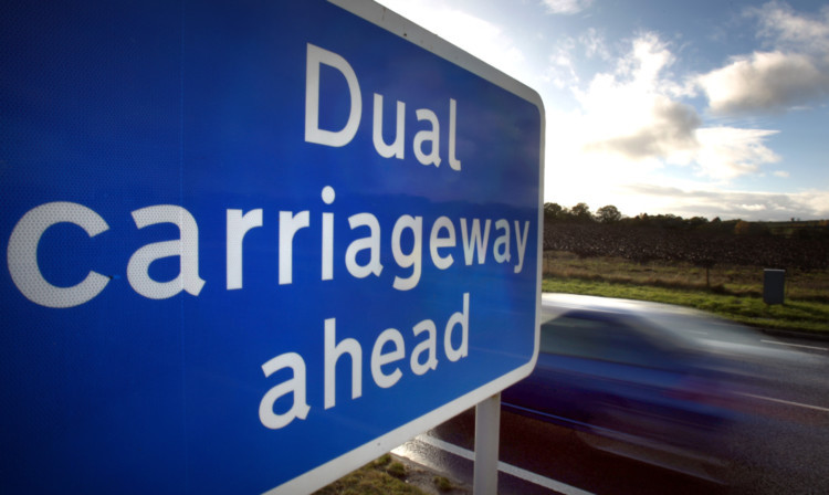 Kris Miller, Courier, 06/11/13. Picture today shows Dual Carriageway ahead sign near Luncarty on the A9 for files.