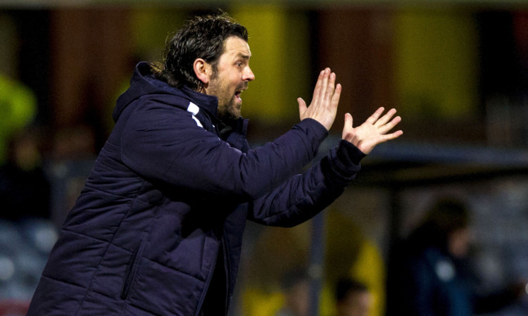 Paul Hartley urging his side on at Dens Park last night.