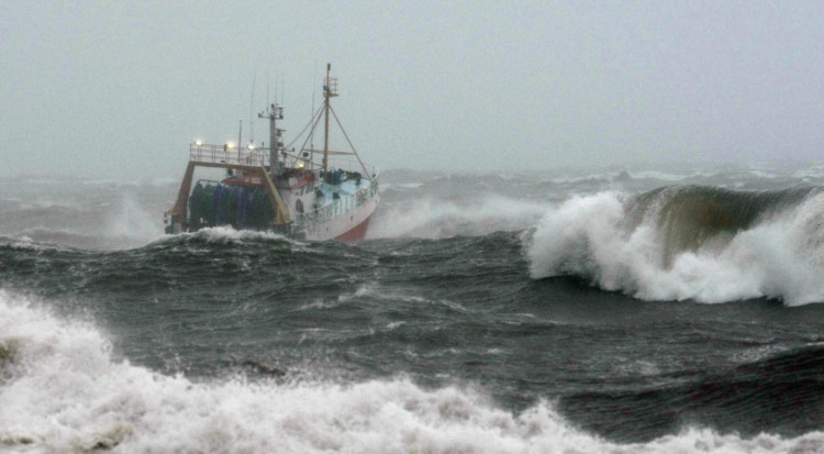 A fishing boat navigates the storm waters around the British Isles.