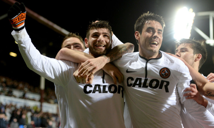 Nadir Ciftci (left) celebrates what turned out to be the winner.